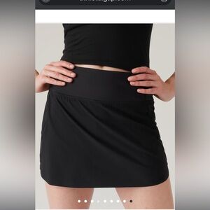 NWOT - ATHLETA RUN WITH IT HIGH RISE 14”SKORT in magenta color